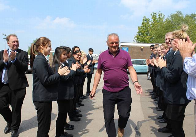 Royton and Crompton School pupils guard of honour for retiring caretaker Malcolm Campbell.