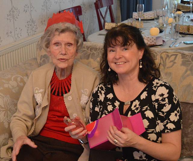 HAPPIER times . . . Elizabeth Crawford with grand-daughter Fiona at a Christmas party
