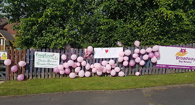 CHILDREN at Broadway Day Nursery, in Royton, tied dozens of balloons to the fence in memory of the victims as a display of love.