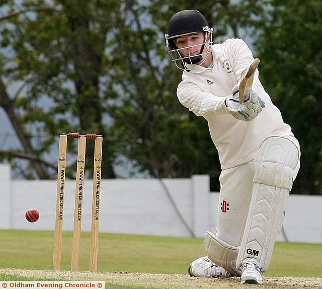 ON THE FRONT FOOT . . . Micklehurst's Lewis Daniel on his way to 55 against Werneth in Sunday's Championship fixture. 