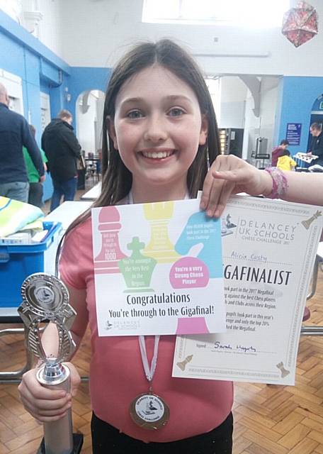 Alicia Custy with her certificate, the Under 10 Suprema Trophy  and her invitation to the Delancy Gigafinal