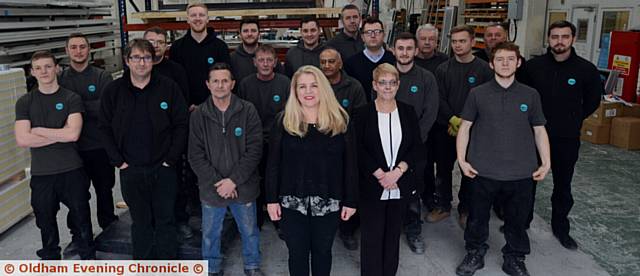 MANAGING director Louise Parfitt (centre) pictured with her team