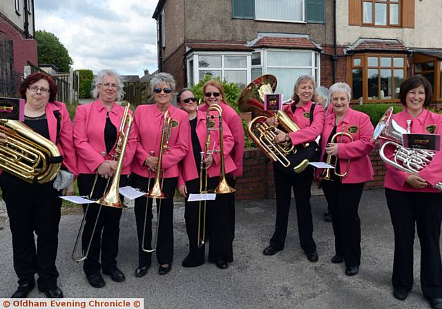PINK LADIES . . . Boobs and Brass at the Lydgate contest _  playing for the Breast Cancer Now charity.