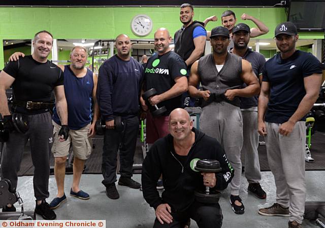OPEN for Ramadan . . . Fitbodz owner Karl Verbruggen (front) with some of his gym members