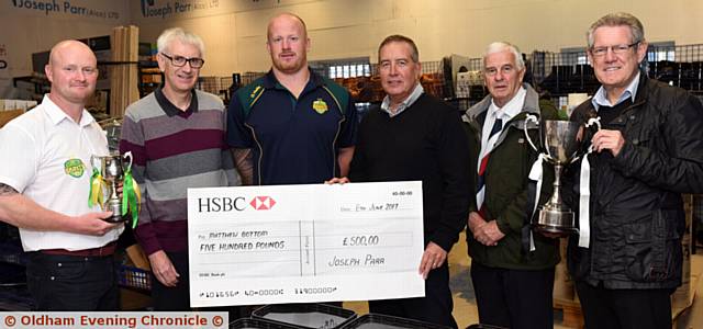 Presentations by Rugby Oldham to players and club officials. PIC shows L-R: Johnny Johnson (St Anne's RLFC Youth Chairman), Mike Kivlin (Rugby Oldham Chair), Matthew Bottom (St Anne's RLFC - Man of Steel winner), Mike Cocker , MD of Joseph Parr (Alco) who presented cheque for £500 to Matthew, Brian Walker (Rugby Oldham) and Peter Townsend (Saddleworth Rangers Secretary).