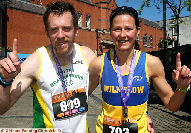 TOP runners . . . the first men and women over the finish line, Rob James and Sharon Johnston