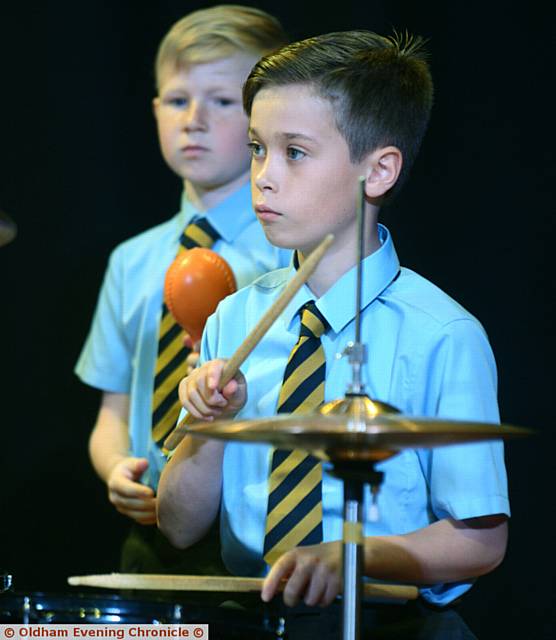 Matthew Jacks (left) and Jacob Parkinson with the St Mary's Primary School, High Crompton wind band