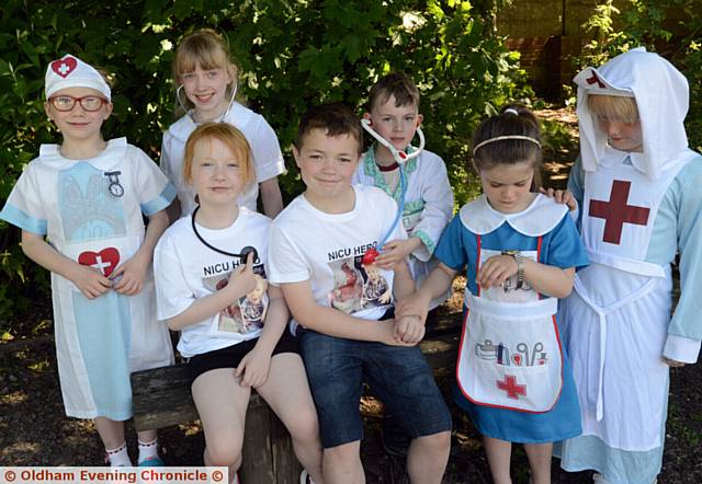 PUPILS at Rushcroft Primary School dress as doctors and nurses. Back, from left, Ellie Wilkinson, Olivia Shaw, and Lachlan Garside. Front, from left, Jessica McDaid, James McDaid (sister and brother of former NICU patient, baby Daniel MacDaid), Mia Bloxsome and Riley Sadler