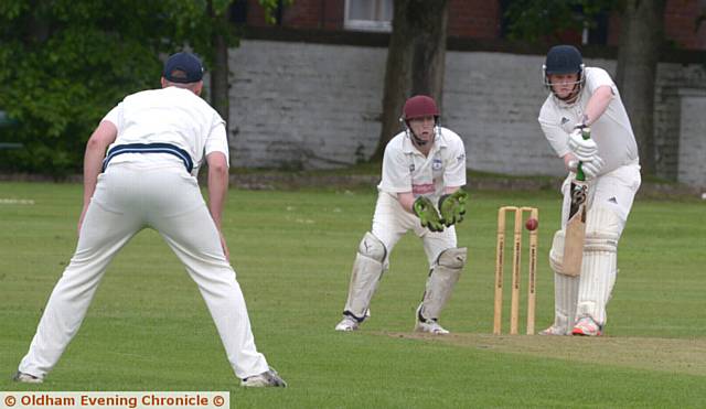 THOU SHALL NOT PASS . . . Werneth's Matt Taylor, who made 89, shows a straight bat

