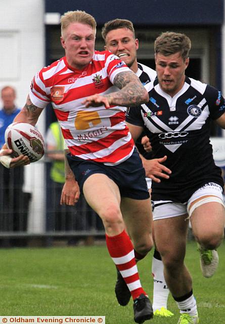 TRY FOR OLDHAM . . . George Tyson 