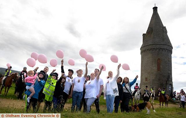 remembering . . . Horse riders pay tribute to terror attack victims at Hartshead Pike, Tameside