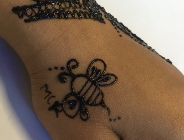 henna bee painted by health and social care students at Oldham Sixth Form College
