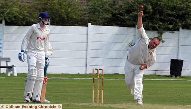 STRIVING for a wicket, skipper Simon Wright steams in for Crompton against Littleborough in the Wood Cup semi-final