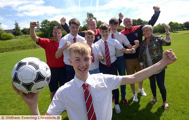 FUNDING BOOST . . . Springhead AFC under-16s captain Jack Donlan (front) with team-mates and members of the committee celebrate the award of a Grow the Game grant. 