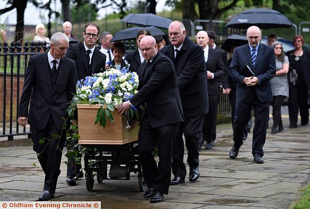 The funeral of Latics' legend Gordon Lawton - secretary at Oldham Athletic. Oldham Parish Church. PIC shows coffin arriving with family.