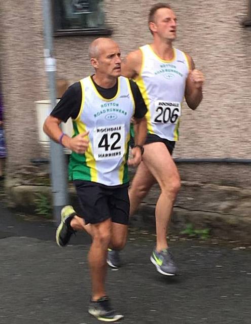 ON THE RIGHT TRACK . . . Richard Cummins (front) makes his mark at the Rochdale 10K