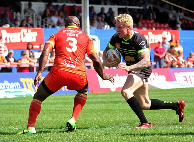 BIG CLASH: Roughyeds centre George Tyson (right) goes up against star Sheffield man Menzie Yere