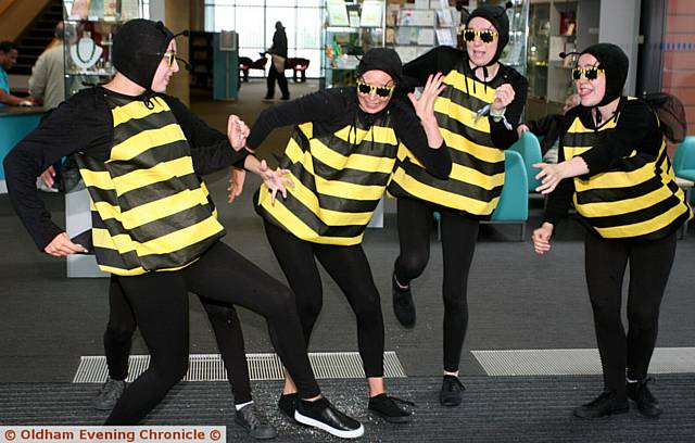BEE happy . . . Cast members from Oldham Theatre Workshop dancing as bees