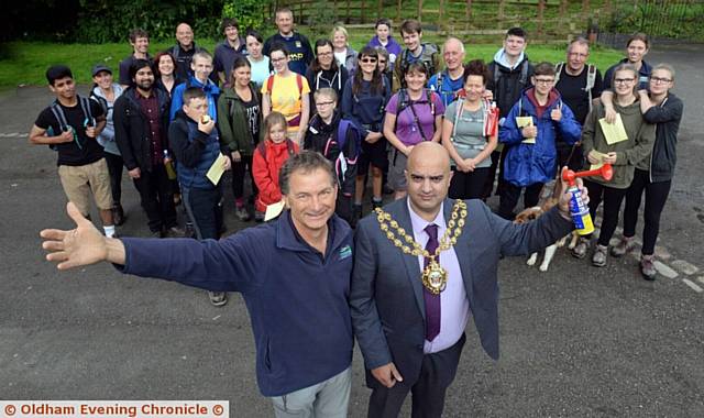 HERE we go . . . Dave Faulconbridge, Castleshaw Centre manager, and the Mayor of Oldham Cllr Shadab Qumer at the 11th Annual Oldham Way Challenge started in Daisy Nook Country Park
