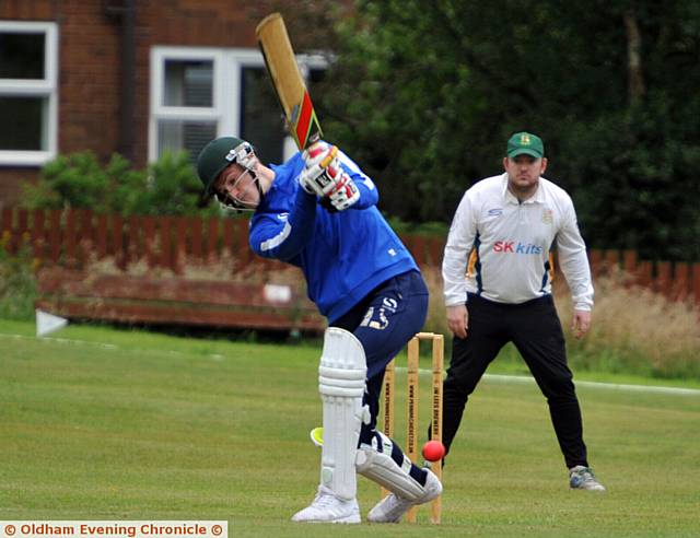 DEFENDER George Edmundson puts bat to ball after opening the batting for Athletic