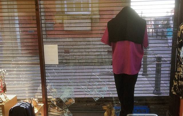 THE smashed front window at the RSPCA's Royton charity shop.