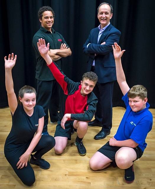 REACH for the stars . . . pupils with Kevin Edward Turner (back left) and Frank Norris
