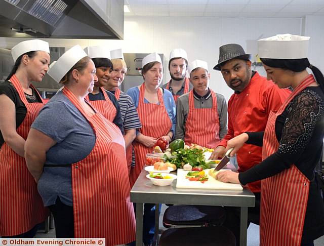 COMMUNITY chef and tutor Afruj Chodhury with those who took part on the course