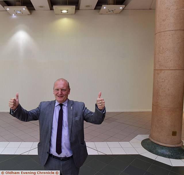 THUMBS up . . . 

Spindles and Town Square manager Mike Flanagan 

outside the former BHS unit in the lower mall