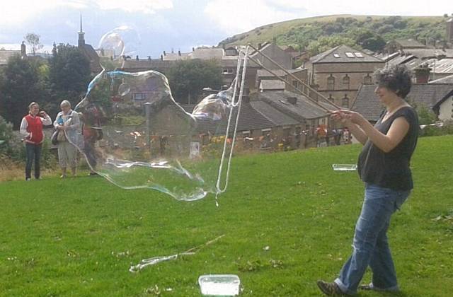 MAKING giant bubbles at Picnic on the Green