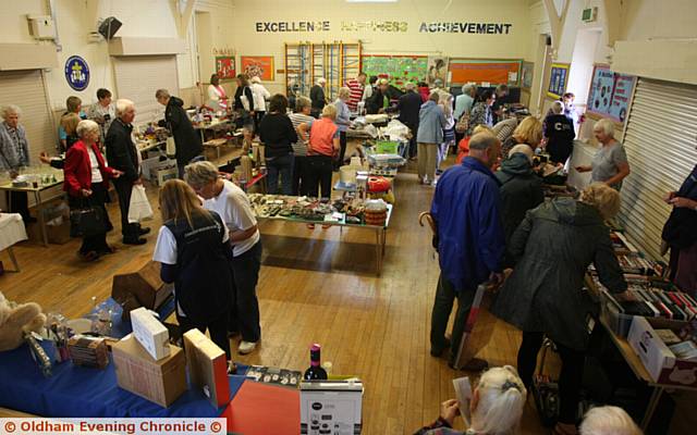 BUSY . . . Bargain-hunters at the final Cancer Research UK annual garage sale