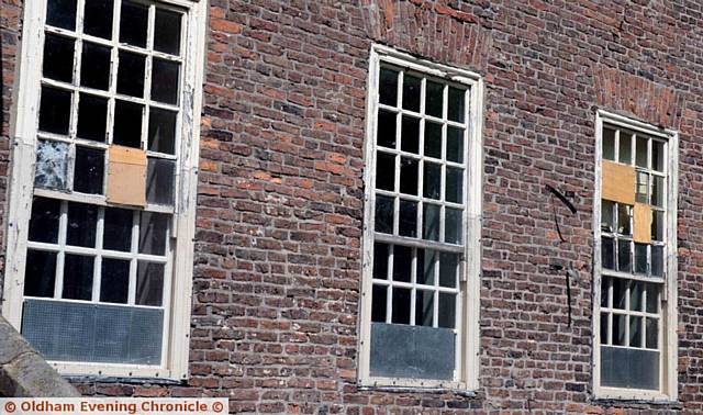 SOME of the smashed windows at Foxdenton Hall
