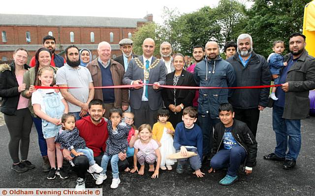 OFFICIAL opening: Left to right, ward councillor Peter Dean, Mayor of Oldham Shadab Qumer, ward councillor Vita Price, along with members of the Clarksfield community group
