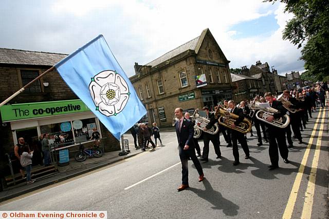 Yorkshire day parade in Uppermill, Oldham. Pic shows, the Delph band parading through Uppermill village.
