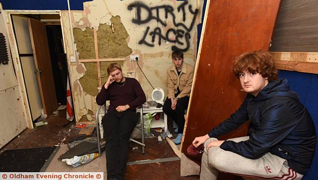 GUTTED . . . Luke Dec, Tom Edwards and Jacob Simpson, of the band Dirty Laces, in their now empty studio