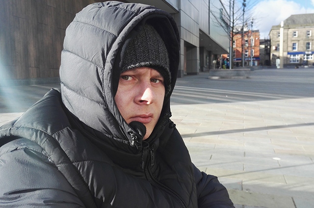 Matthew, a rough sleeper, regularly sits outside the new cinema complex in central Oldham