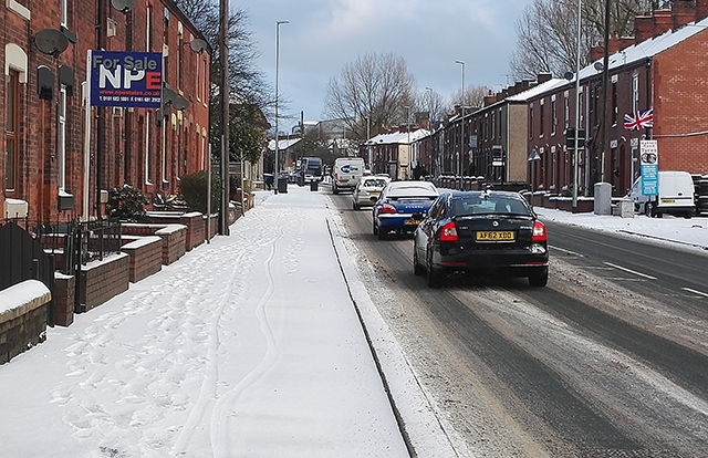 Ashton Road pictured earlier this morning during a break in the snow showers
