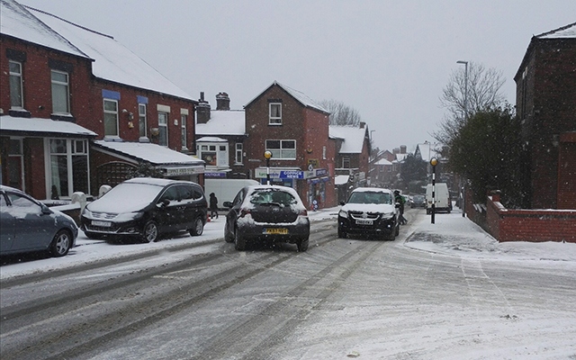 The snowy traffic scene in Coppice this morning