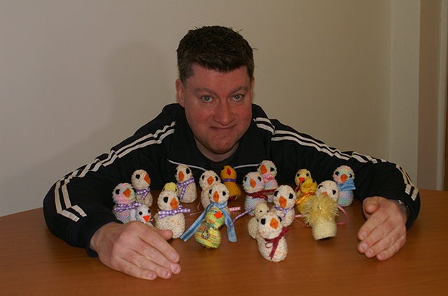 Patrick Scrivens, from the Town Barber Too, with some Easter Chicks