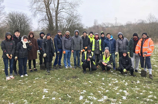 Young Ahmadi Muslims from Oldham dug in to plant trees as part of the increasingly popular 'City of Trees' initiative.