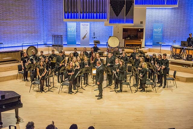 The Oldham Youth Wind Band on stage at the Royal Northern College of Music 