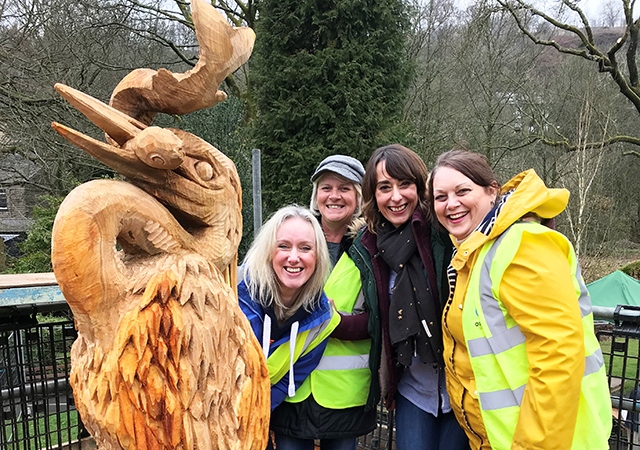 The sculpted Heron and the Saddleworth District Team (from right to left): Christine Wilson, Linda Cain, Lisa Macdonald, and Jane Soriente.