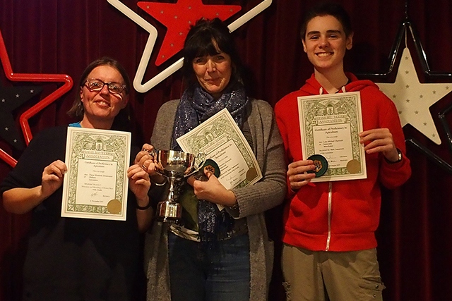 Catherine Charnock, her son Luke, and Diane Drinkwater show off their beekeeping awards