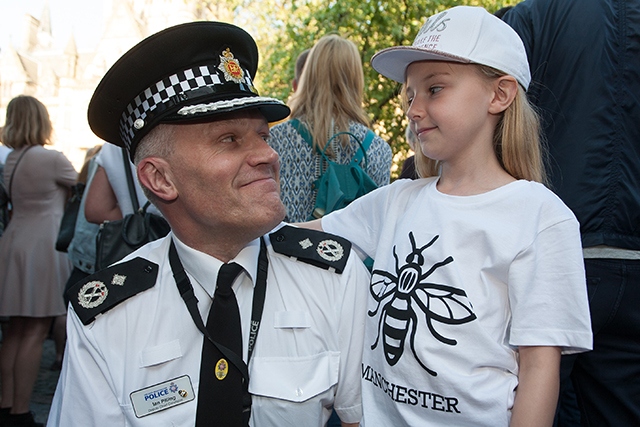 GMP Deputy Chief Constable Ian Pilling is pictured with Lola Bell, aged nine 