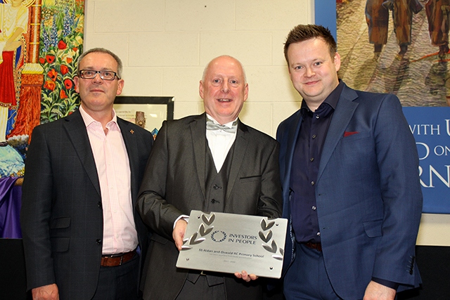 Pictured from left to right are Simon Smith, Diocese of Salford Director of Education,  Damian Harrison, Headteacher and Shaun Murphy, former world champion snooker player
