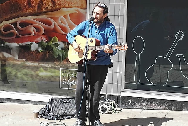 Dave struts his stuff outside Home Bargains in Oldham town centre