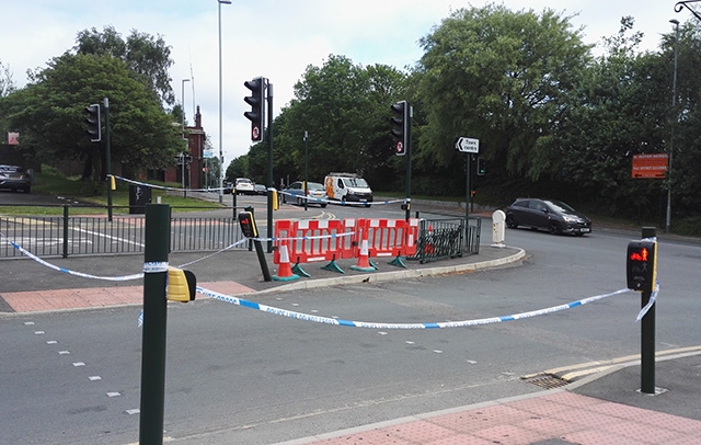 The taped-off scene at the junction of Shaw Road and Egerton Street this morning