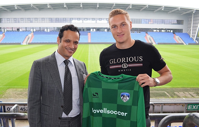 New Athletic loan 'keeper Daniel Iversen pictured with club owner Abdallah Lemsagam