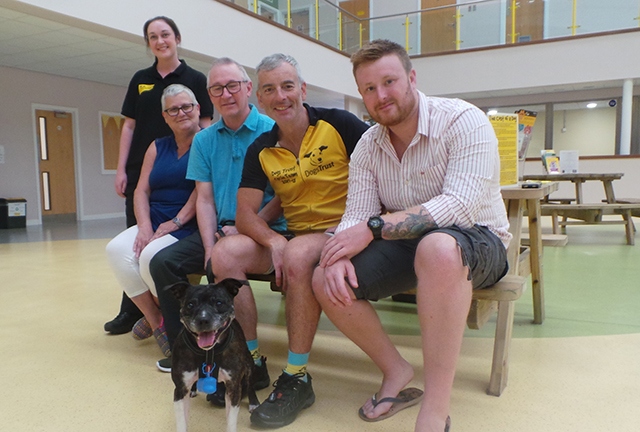 Sam and Staffordshire Bull Terrier, Zina, are pictured with (from left): Home from Home Co-ordinator, Tracey Hill, Zina’s new owners Jayne and Paul Johnson and Zina’s foster carer, Ryan Pritchard.