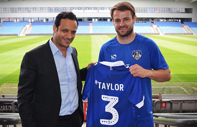 Athletic's summer signing Andy Taylor with club owner Abdallah Lemsagam