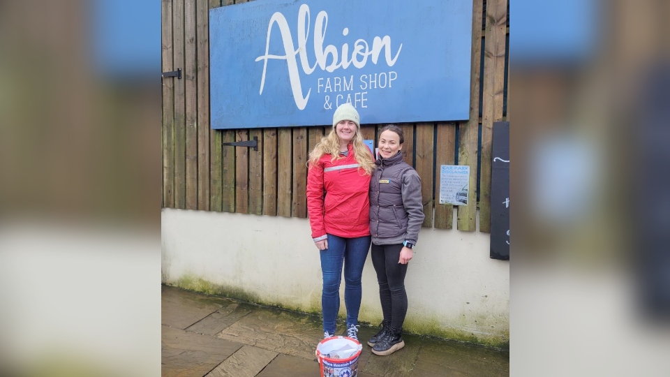 Pictured are Lizzy Partington, Vice Chair, Oldham Mountain Rescue Team, and Martha Tibbot, the Farm Shop Manager